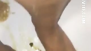 Puked after rubbing shit on her feet