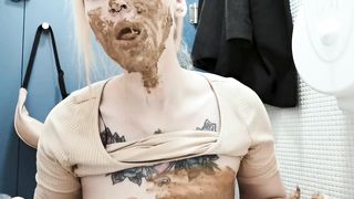 Beautiful blonde eats poop