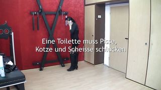 Tattooed brunette girls poop on slave