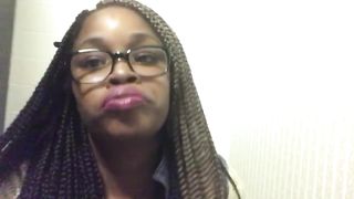 Ebony girl with black glasses shitting