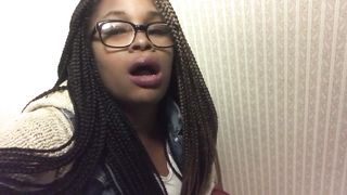 Ebony girl with black glasses shitting