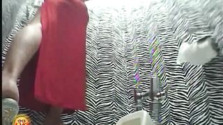 Wearing a tight red dress