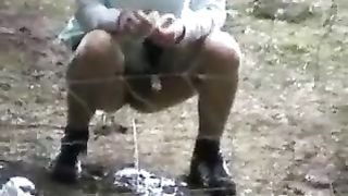 Amateur girl peeing nicely outdoor