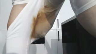 Shitting in her white tights