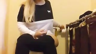 Nerdy blonde babe shitting
