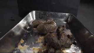 Rubbing shit on entire face