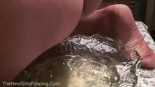 Liquid shit in glass bowl