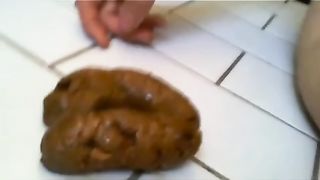 WIFE PICKS UP TURD AND PUTS IN HER MOUTH