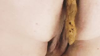Chubby wife shits over toilet