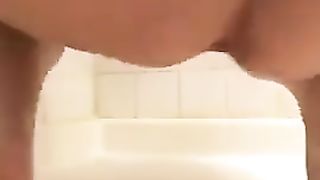 Fingering pussy while shitting slowly
