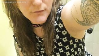 Tattooed babe shits on toilet
