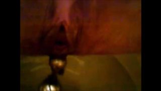 Girl shitting in the toilet and inserting dildo on her asshole