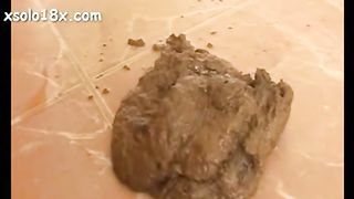 Nice Bitch At Home Raises Her Arse and Shits Plenty.