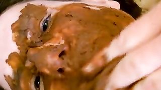 Brown shit on entire face