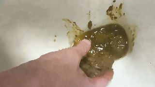 Playing with poop from toilet