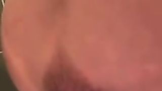 Using huge black dildo to penetrate ass