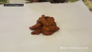 Masked blonde smears brown poop