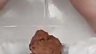 Chubby babe shitting a lot slowly