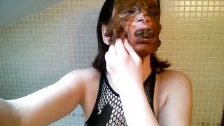 Covered entire face with brown poop