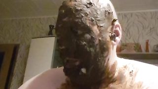 Guy covers himself all over in the shit