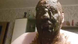Guy covers himself all over in the shit