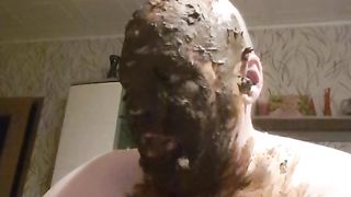 Guy covers himself all over in the shit