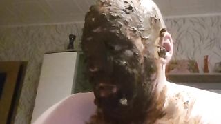 Guy covers himself all over in the shit