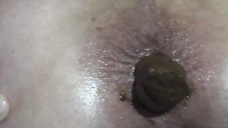 Closeup of hot ass pooping big turd