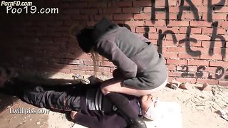 Lovely hot chick pooping on her slave in outdoors