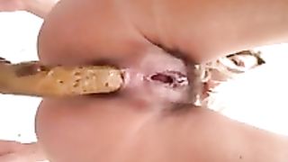Chubby hairy pussy babe pooping in closeup