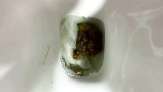 Big thick green turd from pink asshole