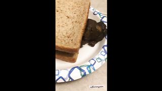 Hot chick making poop sandwich
