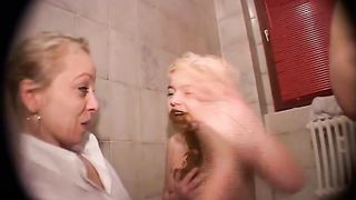 Cute blonde girl enjoying shit on her head