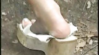 Naked hot brunette teen pooping in the jungle