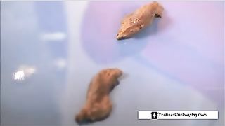 Lovely blonde doll chick pooping