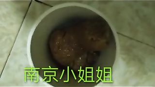 Chinese lady poops in the paper cup