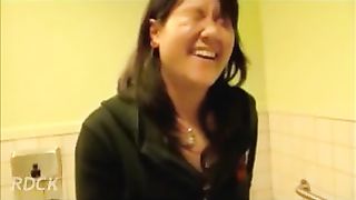 Naughty hot brunette chick pooping in toilet