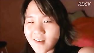 Cute Asian teen pooping in the closeup