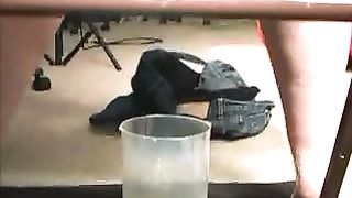 Amateur lady pooping in closeup