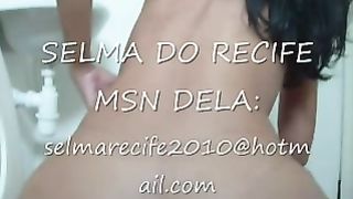 Naked brunette babe poops