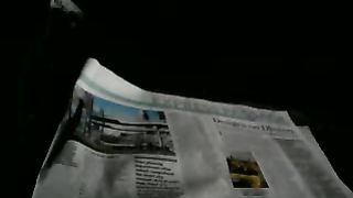 Sitting in the dark on the newspaper