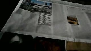 Sitting in the dark on the newspaper