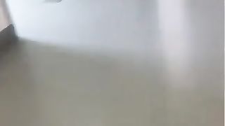 Big poop on the floor of a hospital's toilet