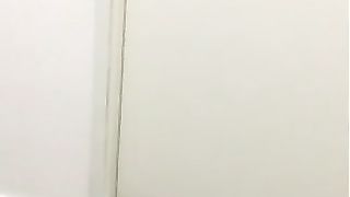 Big poop on the floor of a hospital's toilet