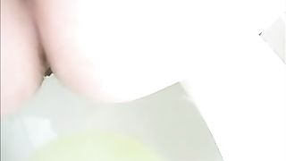 Pretty amateur girl pooping in the toilet