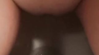 Shaved pussy wife spread legs and pissing in closeup
