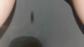 Shaved pussy wife spread legs and pissing in closeup