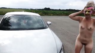 Skinny girl pooping on the car