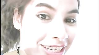 Curvy brunette girl pooping in closeup