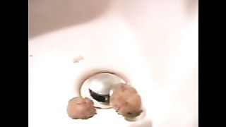 Brunette chick pooping tender pops